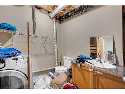 70 Saddlecrest Terrace Ne, Calgary, AB - Indoor Photo Showing Laundry Room