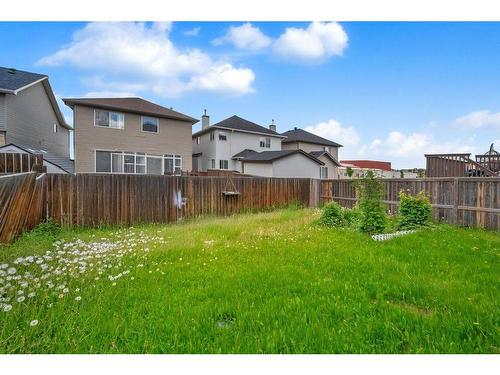 70 Saddlecrest Terrace Ne, Calgary, AB - Outdoor With Backyard With Exterior