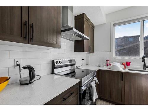 41 Edith Gate, Calgary, AB - Indoor Photo Showing Kitchen