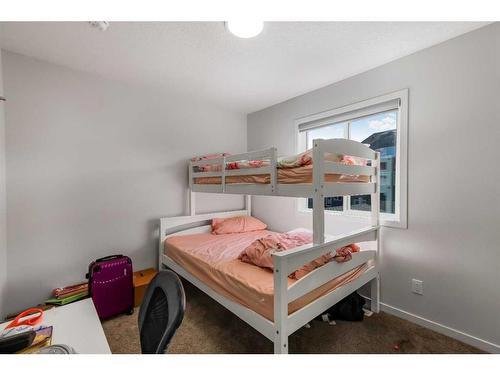 41 Edith Gate, Calgary, AB - Indoor Photo Showing Bedroom