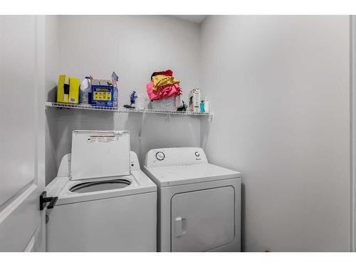 41 Edith Gate, Calgary, AB - Indoor Photo Showing Laundry Room