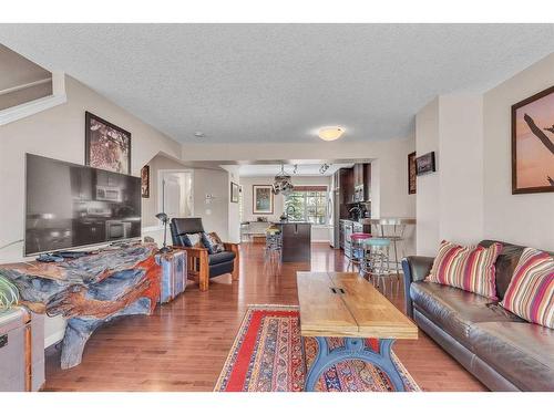 10 Cranford Drive Se, Calgary, AB - Indoor Photo Showing Living Room