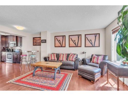 10 Cranford Drive Se, Calgary, AB - Indoor Photo Showing Living Room