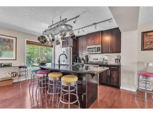 10 Cranford Drive Se, Calgary, AB - Indoor Photo Showing Kitchen With Stainless Steel Kitchen With Upgraded Kitchen