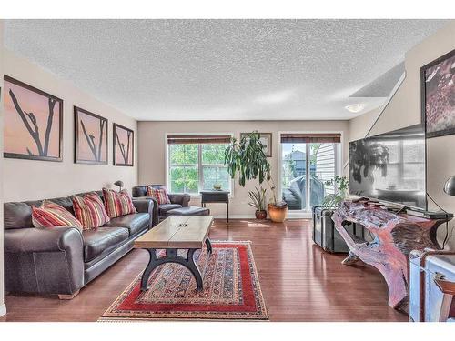 10 Cranford Drive Se, Calgary, AB - Indoor Photo Showing Living Room