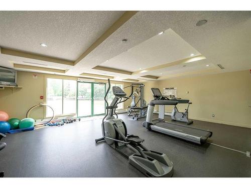 111-3111 34 Avenue Nw, Calgary, AB - Indoor Photo Showing Gym Room