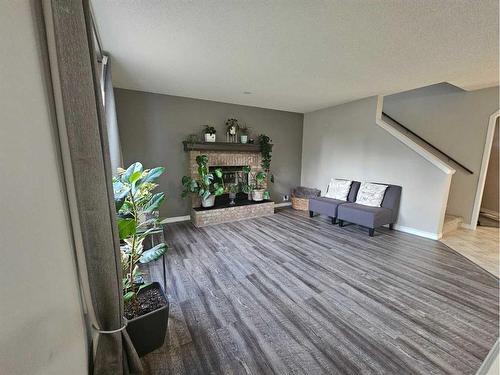 3 Riverwood Close Se, Calgary, AB - Indoor With Fireplace