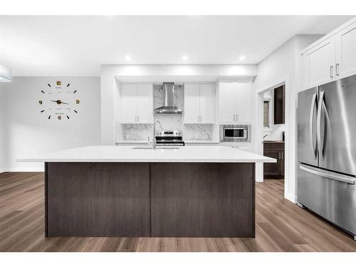 113 Creekside Way Sw, Calgary, AB - Indoor Photo Showing Kitchen With Upgraded Kitchen