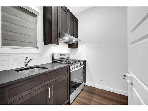 113 Creekside Way Sw, Calgary, AB - Indoor Photo Showing Kitchen