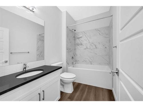 113 Creekside Way Sw, Calgary, AB - Indoor Photo Showing Bathroom