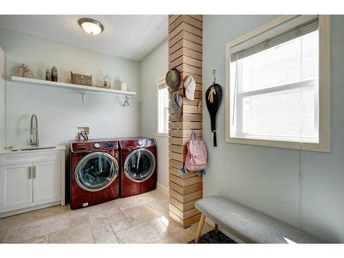 19 Crystal Shores Road, Okotoks, AB - Indoor Photo Showing Laundry Room