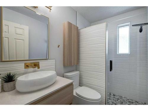 19 Crystal Shores Road, Okotoks, AB - Indoor Photo Showing Bathroom