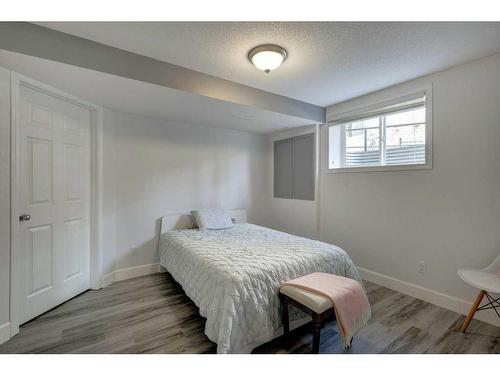 19 Crystal Shores Road, Okotoks, AB - Indoor Photo Showing Bedroom