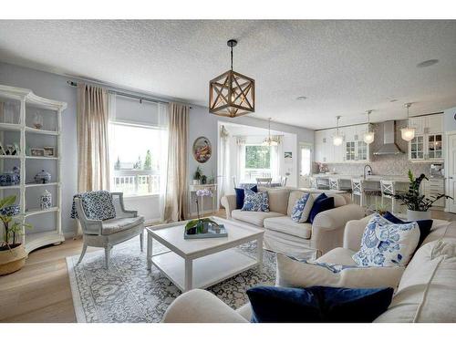 19 Crystal Shores Road, Okotoks, AB - Indoor Photo Showing Living Room