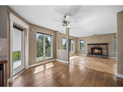 14216 Evergreen Street Sw, Calgary, AB - Indoor Photo Showing Living Room With Fireplace