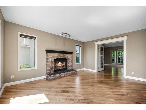 14216 Evergreen Street Sw, Calgary, AB - Indoor Photo Showing Living Room With Fireplace