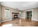 14216 Evergreen Street Sw, Calgary, AB  - Indoor Photo Showing Living Room With Fireplace 