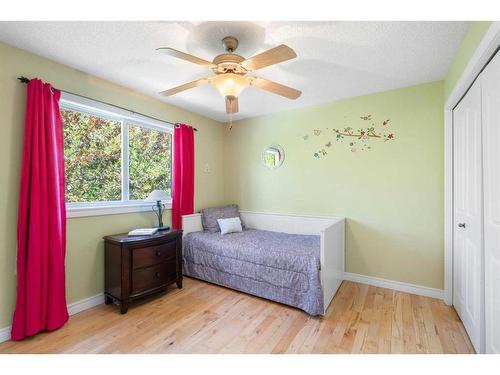 64 Ranchridge Way Nw, Calgary, AB - Indoor Photo Showing Bedroom