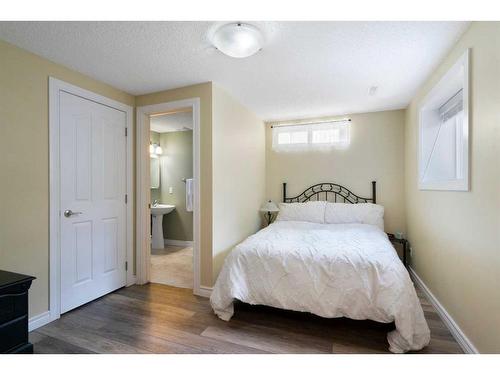 64 Ranchridge Way Nw, Calgary, AB - Indoor Photo Showing Bedroom