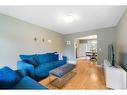 64 Ranchridge Way Nw, Calgary, AB  - Indoor Photo Showing Living Room 