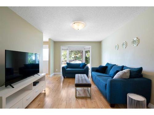 64 Ranchridge Way Nw, Calgary, AB - Indoor Photo Showing Living Room