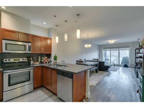 314-1899 45 Street Nw, Calgary, AB - Indoor Photo Showing Kitchen With Stainless Steel Kitchen