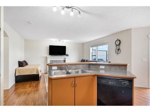 131 Tarawood Grove, Calgary, AB - Indoor Photo Showing Kitchen With Double Sink