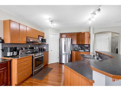 131 Tarawood Grove, Calgary, AB - Indoor Photo Showing Kitchen With Stainless Steel Kitchen With Double Sink