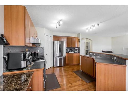 131 Tarawood Grove, Calgary, AB - Indoor Photo Showing Kitchen With Double Sink