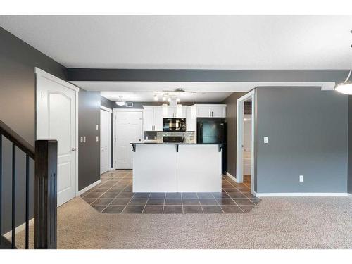 312-141 Mountain Street, Cochrane, AB - Indoor Photo Showing Kitchen