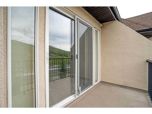 312-141 Mountain Street, Cochrane, AB - Outdoor With Exterior