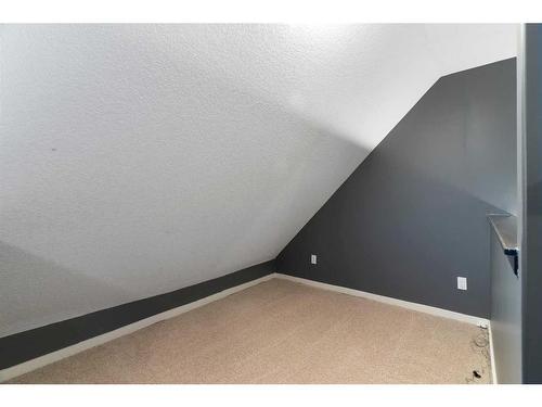 312-141 Mountain Street, Cochrane, AB - Indoor Photo Showing Other Room