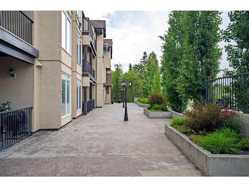 312-141 Mountain Street, Cochrane, AB - Outdoor With Exterior