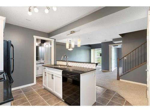 312-141 Mountain Street, Cochrane, AB - Indoor Photo Showing Kitchen