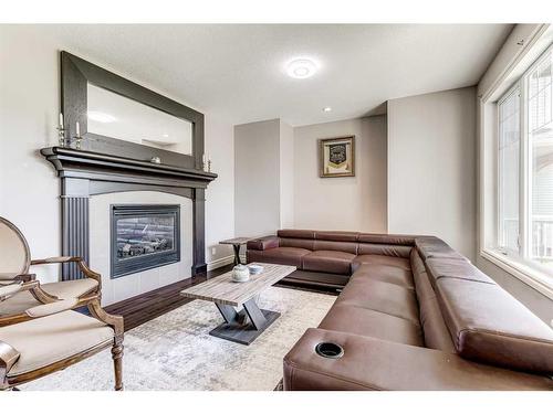 50 Sage Hill Way Nw, Calgary, AB - Indoor Photo Showing Living Room With Fireplace