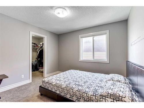 50 Sage Hill Way Nw, Calgary, AB - Indoor Photo Showing Bedroom