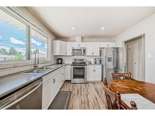 4611 Forman Crescent Se, Calgary, AB - Indoor Photo Showing Kitchen With Stainless Steel Kitchen With Double Sink
