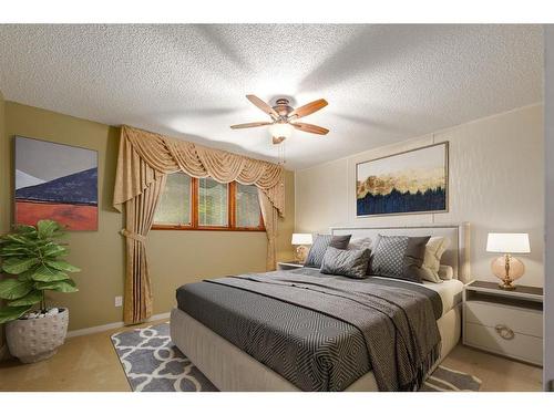 1012 Cannock Road Sw, Calgary, AB - Indoor Photo Showing Bedroom