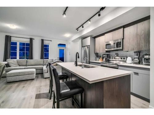 133 Walgrove Common Se, Calgary, AB - Indoor Photo Showing Kitchen With Stainless Steel Kitchen With Double Sink