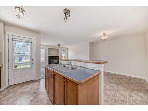 89 Tuscany Springs Heights Nw, Calgary, AB - Indoor Photo Showing Kitchen With Double Sink