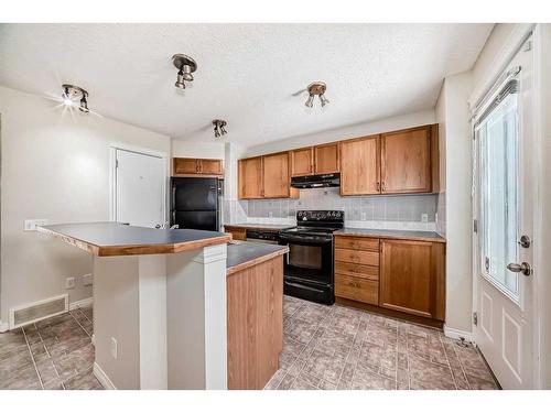 89 Tuscany Springs Heights Nw, Calgary, AB - Indoor Photo Showing Kitchen