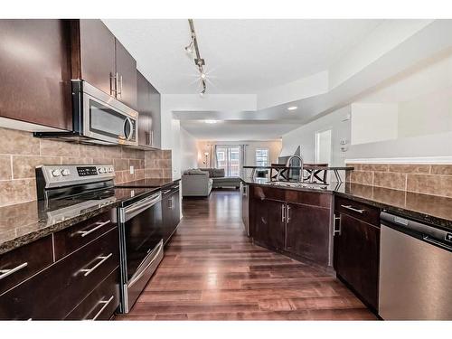 127 Auburn Bay Common Se, Calgary, AB - Indoor Photo Showing Kitchen With Upgraded Kitchen