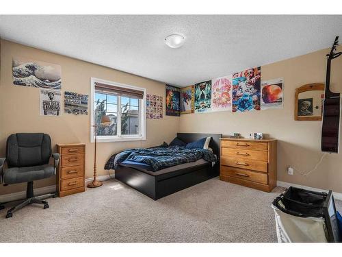 1107 Panamount Boulevard Nw, Calgary, AB - Indoor Photo Showing Bedroom