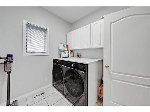 468 Mckenzie Lake Bay Se, Calgary, AB - Indoor Photo Showing Laundry Room