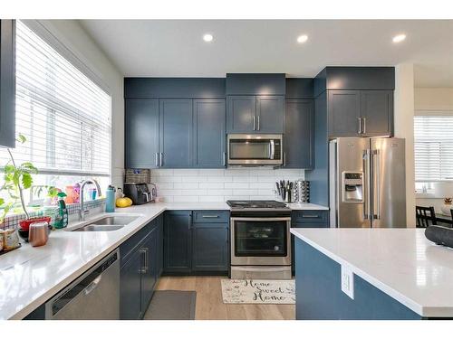 126 Sage Meadows Gardens Nw, Calgary, AB - Indoor Photo Showing Kitchen With Double Sink With Upgraded Kitchen