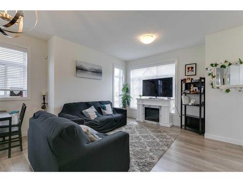 126 Sage Meadows Gardens Nw, Calgary, AB - Indoor Photo Showing Living Room With Fireplace