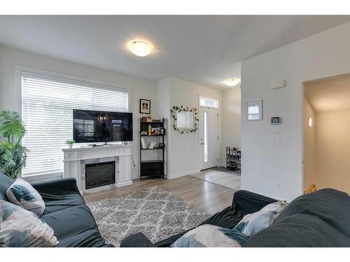 126 Sage Meadows Gardens Nw, Calgary, AB - Indoor Photo Showing Living Room With Fireplace