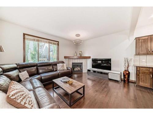 41 Everbrook Drive Sw, Calgary, AB - Indoor Photo Showing Living Room With Fireplace