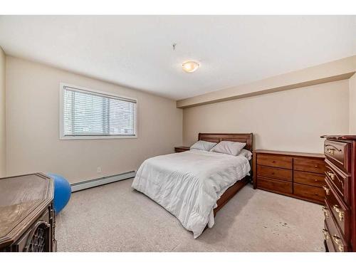 2304-10 Prestwick Bay Se, Calgary, AB - Indoor Photo Showing Bedroom