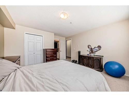 2304-10 Prestwick Bay Se, Calgary, AB - Indoor Photo Showing Bedroom